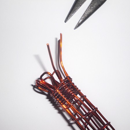 Finishing the weavers with loops at the top.