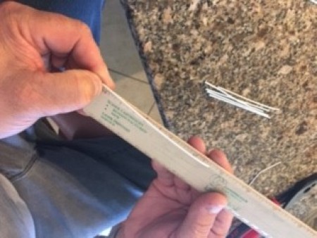 Measuring pieces of wire.