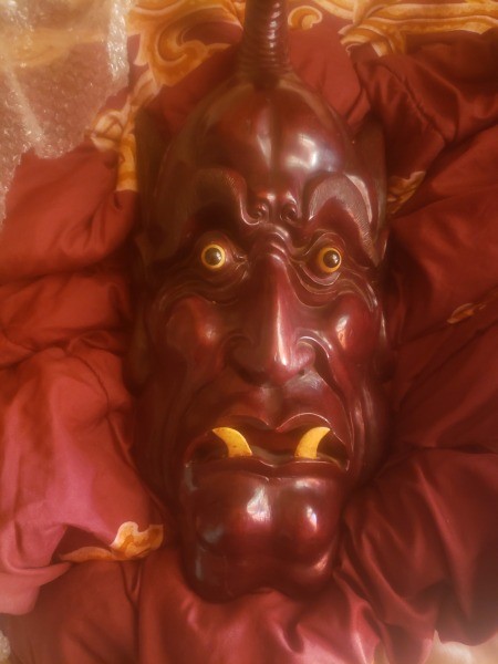 A large wooden mask.
