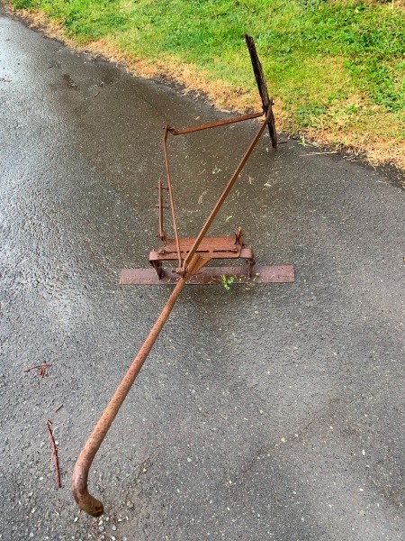 An old metal plow.