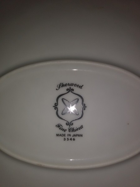 A marking on the bottom of a china platter.