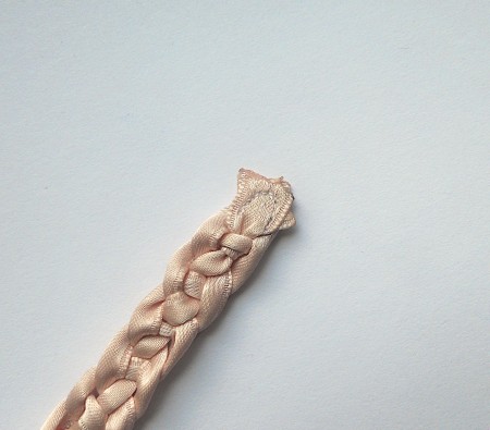 The end of the braided belt.