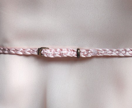 The braided ribbon belt.