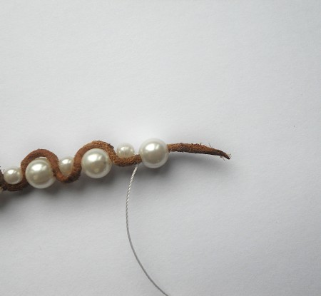 Finishing the end of the bracelet.