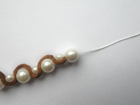 Finishing the end of the bracelet.