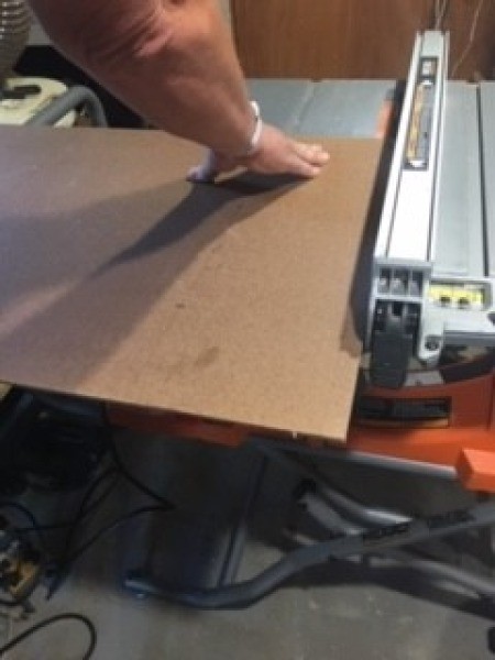Cutting a board to the right size.