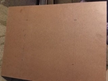 The board with holes drilled.