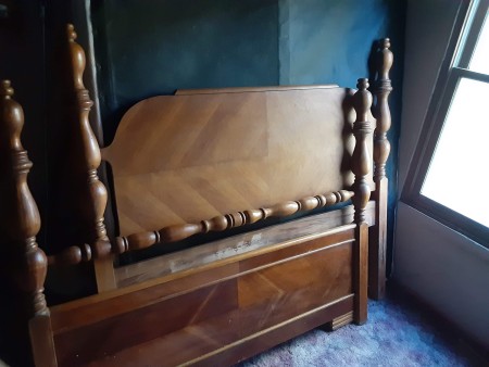 A vintage headboard and footboard.