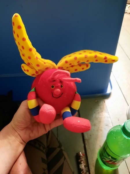 A brightly colored stuffed toy.