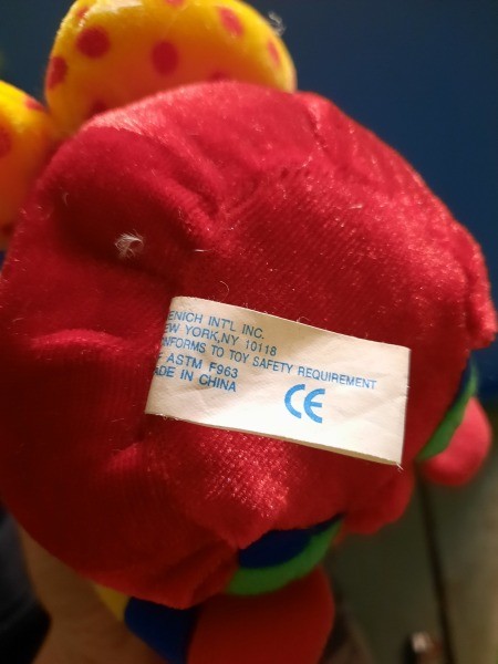 A brightly colored stuffed toy.