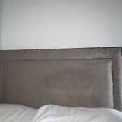 A stain on a suede headboard.