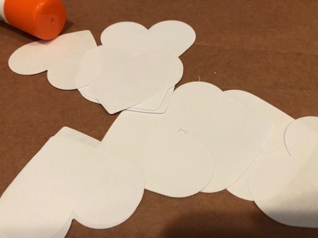 Heart shapes cut out of paper.