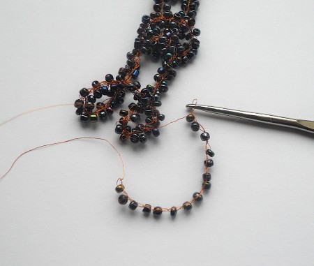 crocheted chain with beads