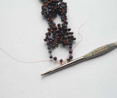 fold first ring over the chain and slip stitch to form circle