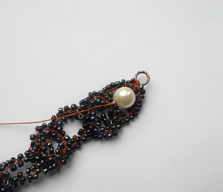 adding mother of pearl beads in openings