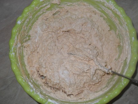 Mixing the whipped cream with the biscuit mix.