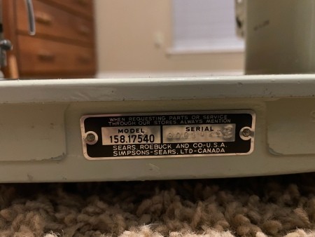 The serial number on a sewing machine.