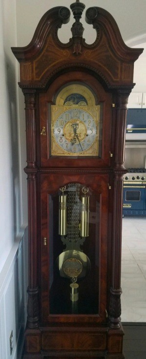 A tall grandfather clock.