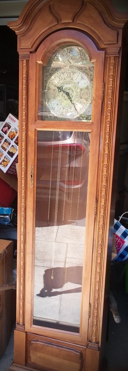 A tall wooden clock.