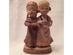 A figurine of two girls.