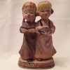 A figurine of two girls.