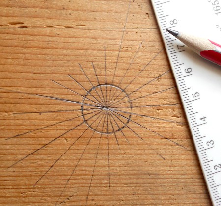 A circle with rays drawn from the center.