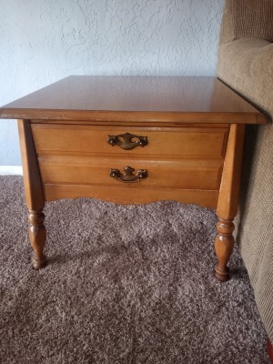 A two drawer Bassett end table.
