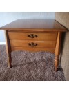 A two drawer Bassett end table.