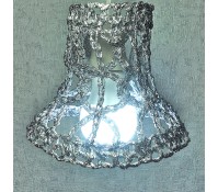 The crocheted foil lampshade.