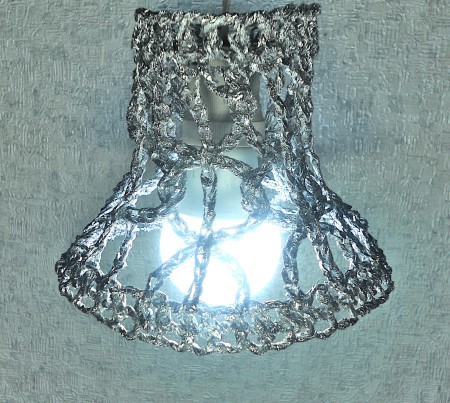 The crocheted foil lampshade.