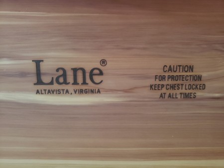 The Lane marking inside a cedar chest.