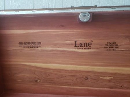 The Lane marking inside a cedar chest.