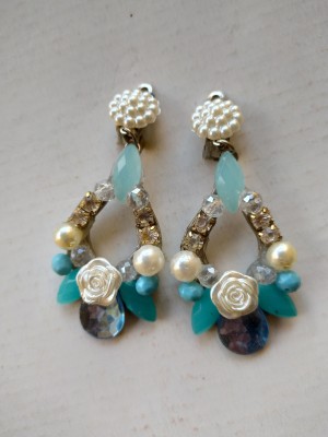 A pair of beaded earrings.