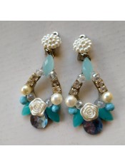 A pair of beaded earrings.