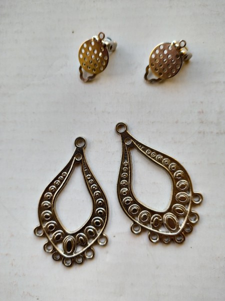 The earring hardware and beading backing.