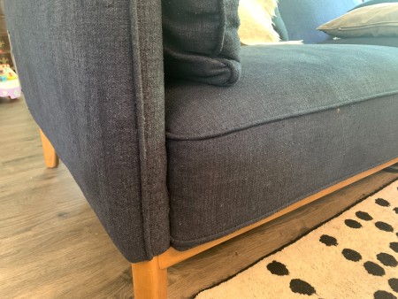 The fixed couch, looking nearly brand new.
