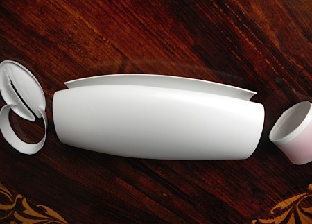 The bottle after cutting the top and bottom off and splitting the side.