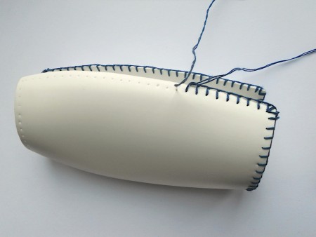 Mark the edges with blue thread.