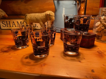 A set of vintage bar glasses.