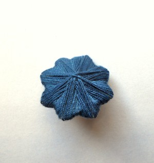 The completed Eight-Pointed Star Thread Button