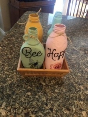 The completed bottle decor on a granite countertop.