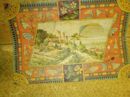 The inside of an old wooden chest.