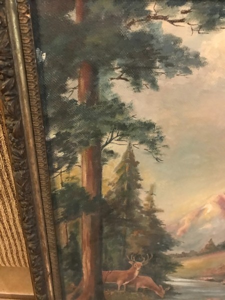 A landscape painting with trees, mountains and deer.