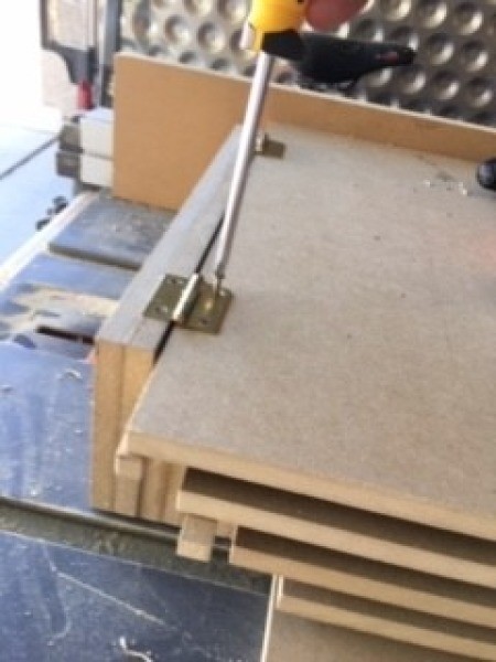 Constructing a custom made jewelry box.