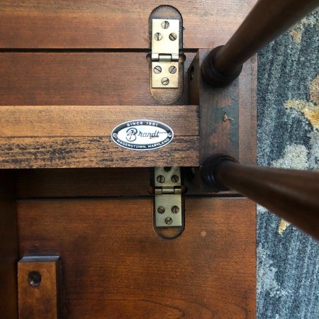 The Brandt logo on the bottom of the table.