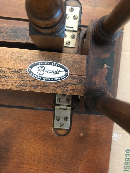 The Brandt logo on the bottom of the table.
