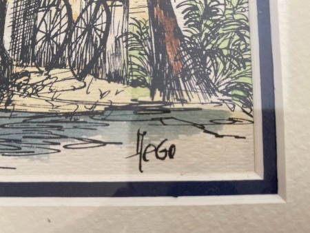 A close up of the signature of a watercolor painting of Key West.