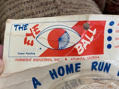 A baseball toy with Hank Aaron's signature.