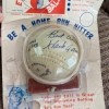 A baseball toy with Hank Aaron's signature.