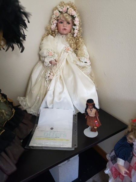 A collectible porcelain doll.